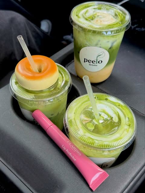 Three Peelo iced matcha drinks, including one topped with flan
